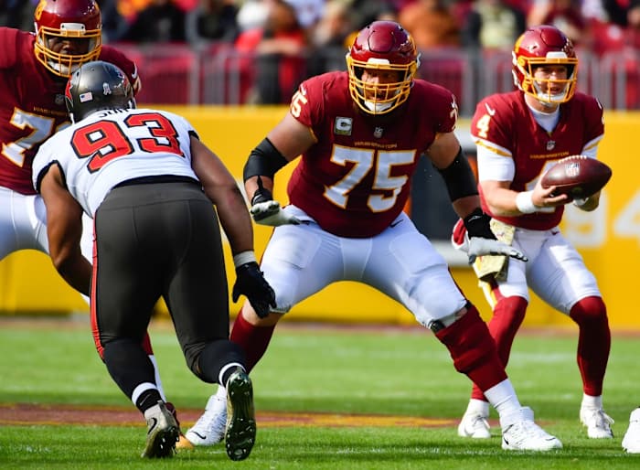 Nov 14, 2021; Landover, Maryland, USA; Washington Football Team guard Brandon Scherff (75) prepares to block Tampa Bay Buccaneers defensive tackle Ndamukong Suh (93) during the first half at FedExField. Mandatory Credit: Brad Mills-USA TODAY Sports